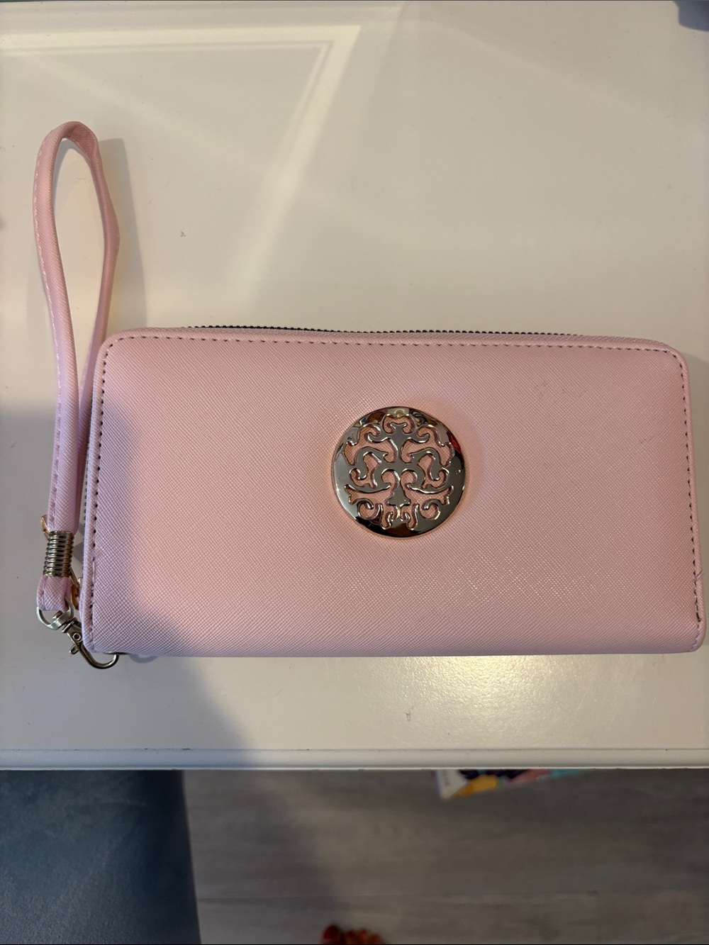 Pink Women's Wristlet Wallet with Decorative Medallion